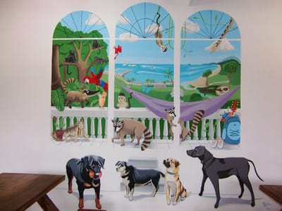 Trompe l'oeil mural in anime style with jungle animals and dogs.  