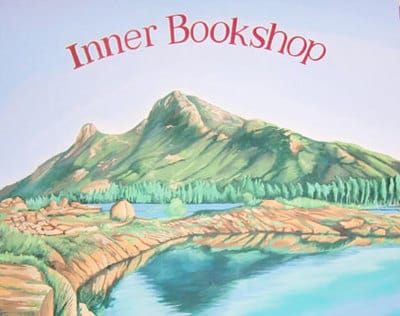 Bookshop mural with Indian mountains and lake. 