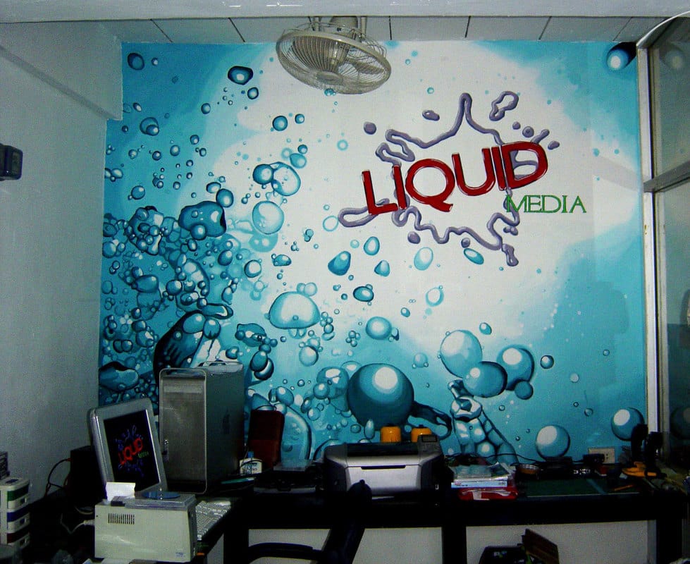 Mural with water droplets and Liquid Media logo in Koh Tao. 