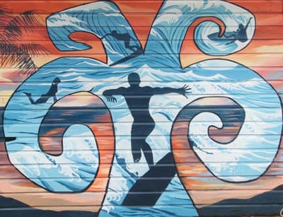 Surf mural with sunset background in Bocas del Toro.