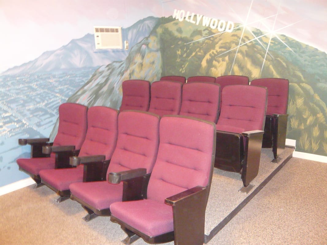 Hollywood themed mural in home cinema.