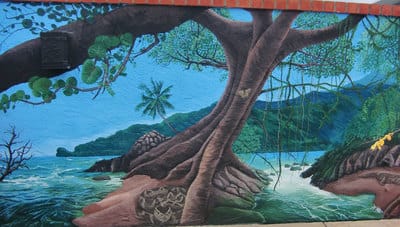 Costa Rica inspired rainforest mural with jungle animals and tropical beaches in San Diego