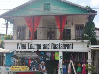 Hand painted shopfront lettering on Bocas del Toro wine bar. 